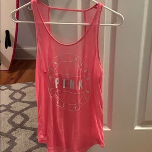 Hot pink tank top.